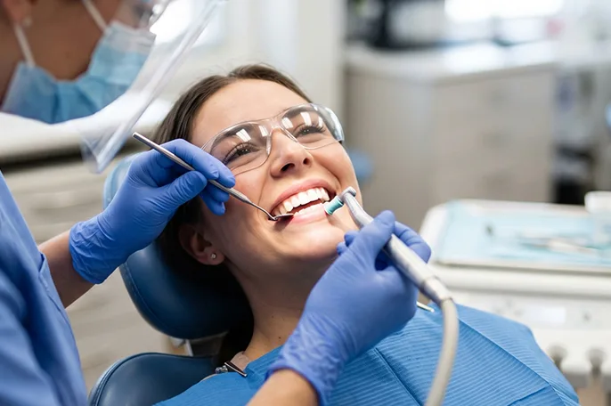 Patient in a dental chair during a routine preventive visit